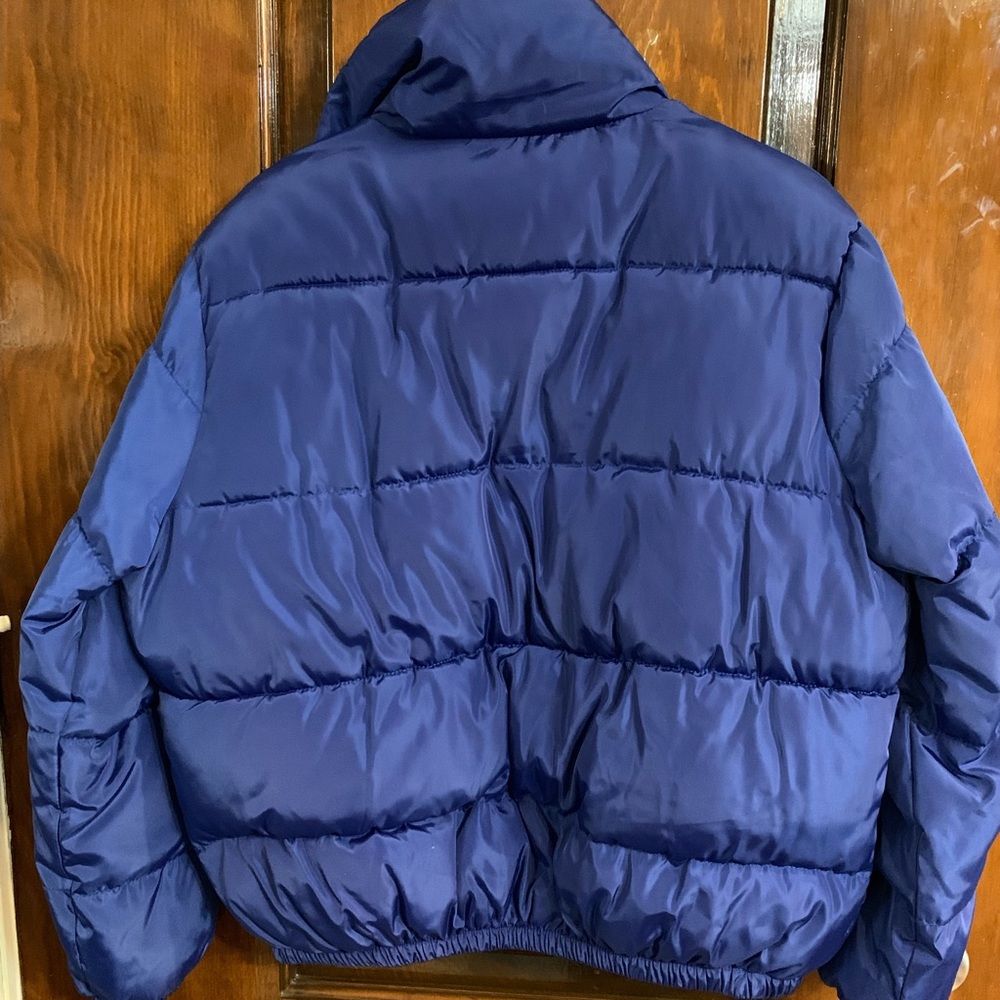 Royal blue puffer jacket. Size large. In good condition. No rips or stains.